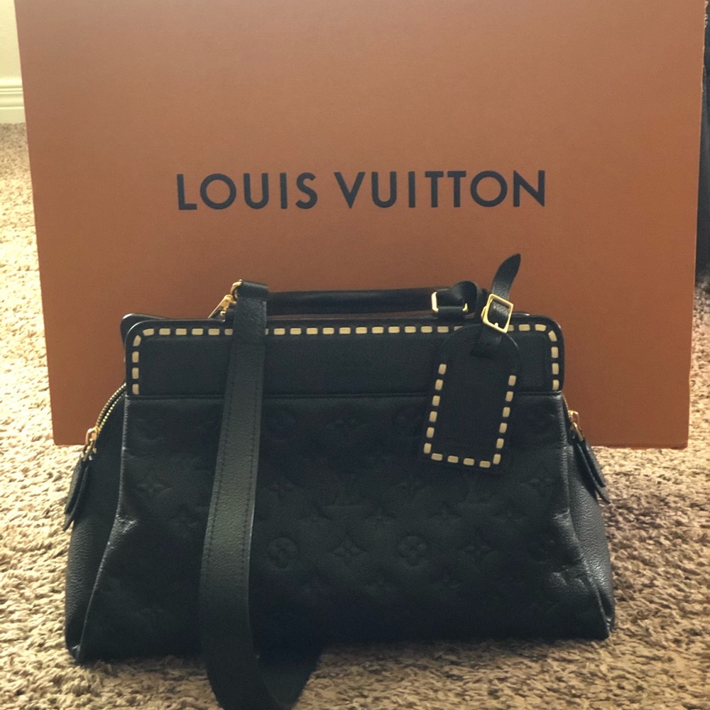 Louis VuittonMonogram Empreinte Leather Vosges MM